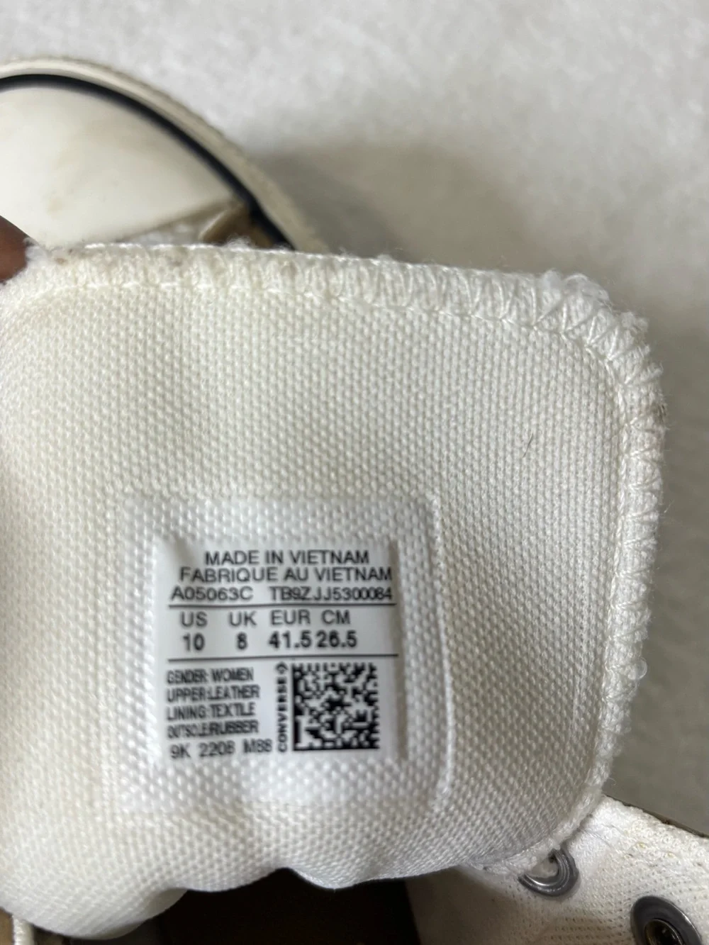 Converse Kids Tan High-Top Sneakers with White Sherpa Lining and Yellow Pull Tab